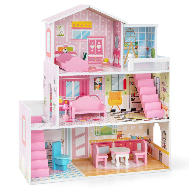 Pink three-storey wooden dollhouse with miniature furniture