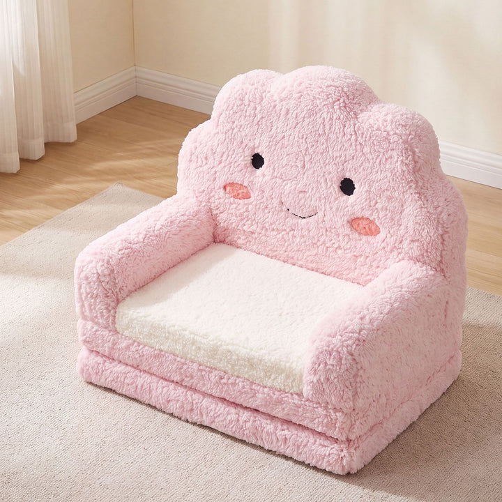 Pink cloud toddler flip-out sofa, front view in seating configuration