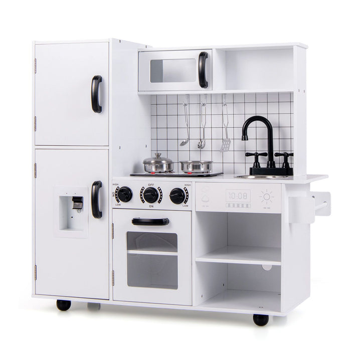 White and black play kitchen with pretend dispenser, stove tops, microwave, oven, sink and silver-coloured cookware