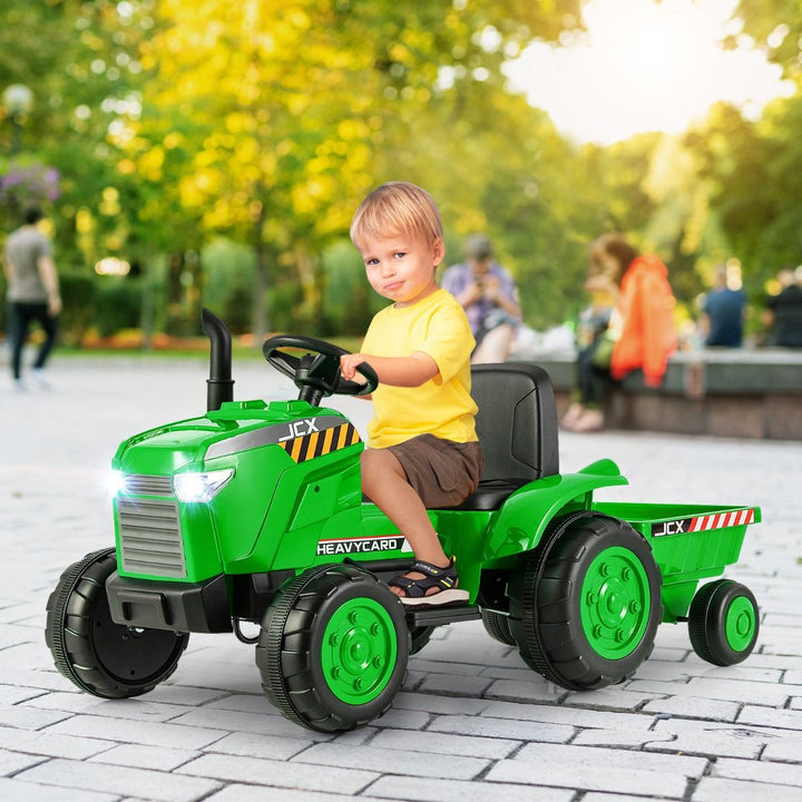 Green tractor ride-on with low detachable trailer