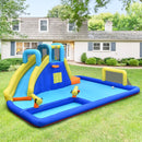 Inflatable water park with slide and football goal in a garden