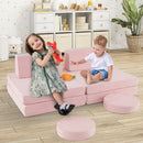 Pink modular velvet play couch in a playroom