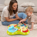 Parent supervising blue floor-play tray