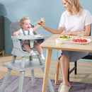 Grey convertible high chair, family mealtime setting