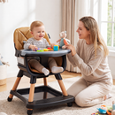 Black convertible high chair with tan cushion during supervised seated play