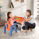 Orange dinosaur table and one chair: shown during adult-supervised drawing