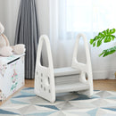 Grey step stool viewed from the front in a room setting