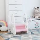 Pink step stool beside a chest of drawers, showing its grooved steps