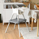 Grey convertible high chair, high chair in a room