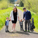 Grey tandem double stroller, folded stroller during an outing
