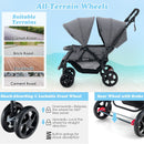 Grey tandem double stroller, front swivel-wheel locks and rear foot brakes