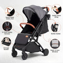 Grey folding stroller, harness, wrist strap, bumper and storage details
