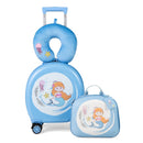 Blue mermaid suitcase and matching backpack on white, photographed with a neck pillow and luggage tag whose inclusion is unconfirmed.