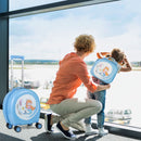 Blue mermaid suitcase beside a child wearing the matching backpack at an airport window with an adult.