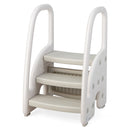 Grey and White three-step stool from the opposite side, showing the product age-warning label