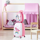 White and pink unicorn suitcase and music-print backpack in a styled room; furniture excluded