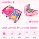 Open pink cloud luggage showing compartments; contents are styling props
