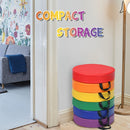 Six round cushions stacked with black carry handles visible