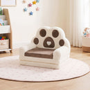 Brown and cream paw-back toddler sofa in seated configuration; surrounding furniture and toys are not included