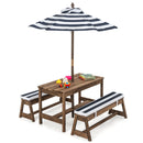 Wooden table and two separate cushioned benches with blue and white striped umbrella; tabletop toys are not included