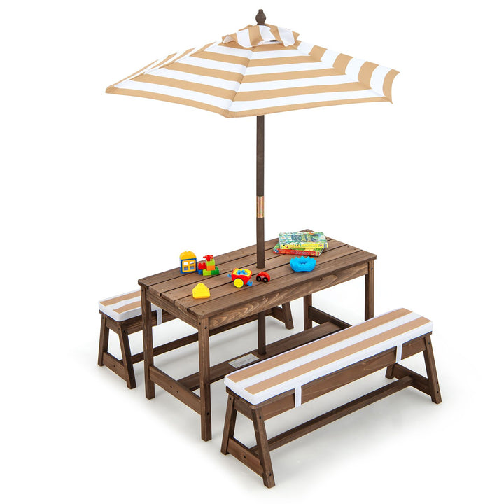 Wooden table and two separate cushioned benches with brown and white striped umbrella; tabletop toys are not included