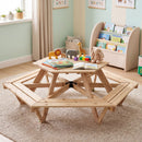 Wooden kids picnic table in an indoor activity setting; toys and room furnishings are not included