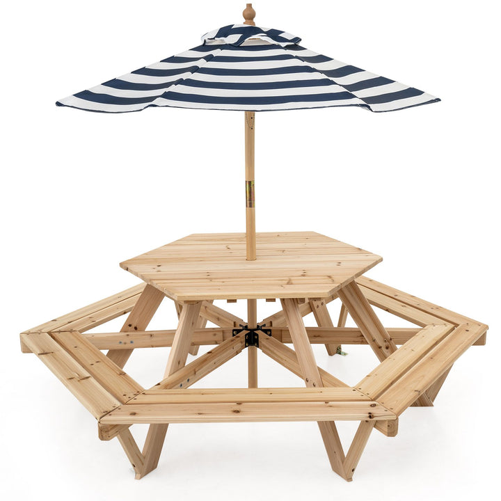 Natural hexagonal kids picnic table with six bench sections and blue-and-white umbrella