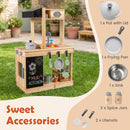 Mud kitchen pot with lid, frying pan, sink, two spice jars and two utensils