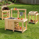 Mud kitchen and separate pretend cooking stations arranged in a garden; styling props not included