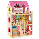 Assembled pink three-storey dollhouse with furnished rooms