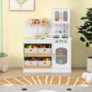 White play kitchen in a room setting; plants and extra styling props are not included