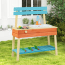 Blue and orange outdoor mud kitchen in a garden setting; plants and decorative pots are not included