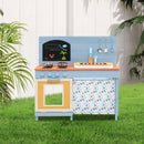 Blue outdoor play kitchen with hinged cabinet door and curtain-front lower shelf; plants are not included