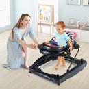 Parent supervising black baby walker