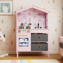 Pink house-shaped wooden play kitchen, room view