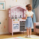 Pink house-shaped wooden play kitchen, pretend play scene