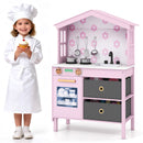 Pink house-shaped wooden play kitchen, play kitchen and child