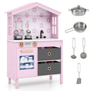 Pink house-shaped wooden play kitchen, room view