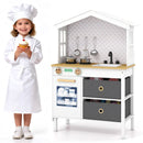 White house-shaped wooden play kitchen, play kitchen and child