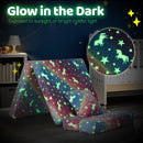 Multicolour unicorn-patterned sofa demonstrating its glow after exposure to light