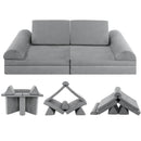 Grey modular foam play sofa with triangular back cushions, semicircular cushions and folding mats