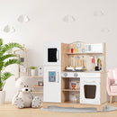 White and natural play kitchen with open shelves and toy appliances