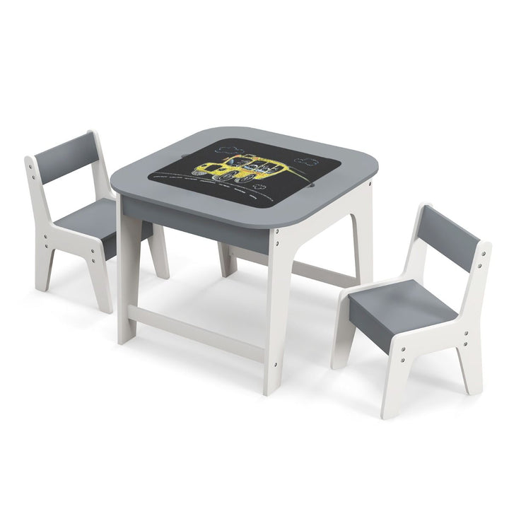Grey and white reversible activity table with two chairs, chalkboard side shown