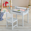 Grey drawing table and chair with paper roll in a playroom