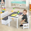 Child seated at grey and white activity table with matching chair and bench