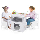 Children seated at the white activity table with two chairs