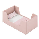 Pink velvet upholstered toddler bed frame with shaped side panels