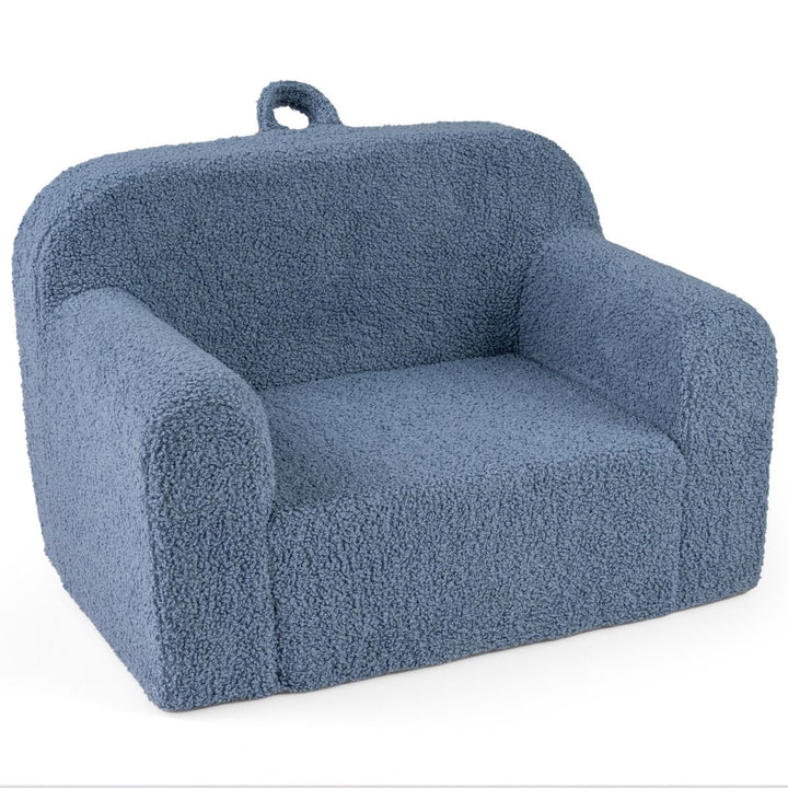 Blue teddy-fleece foam armchair, angled view with carry handle