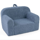 Blue teddy-fleece foam armchair, angled view with carry handle