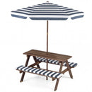 Blue-striped umbrella and cushioned picnic table